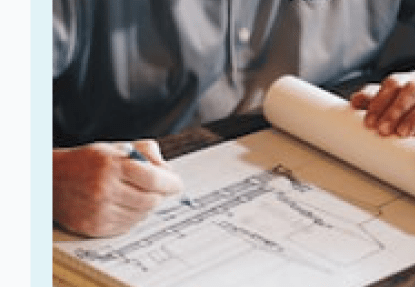 Architect working on plans